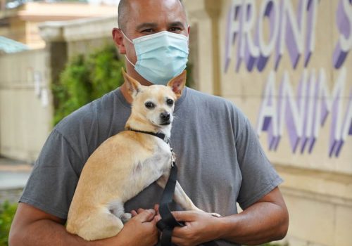 Man with small dog